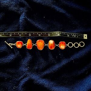 Silver and orange coral bracelet